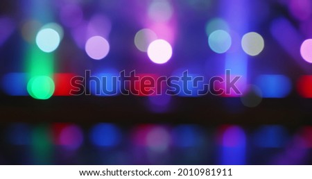 Beautiful blur RGB color moving in dark background