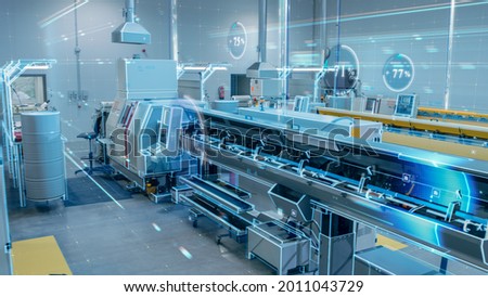 Futuristic Concept: Blurry Factory Digitalization with Information Showing Efficiency Percentage of High-Tech Modern Electronics Facility. Royalty-Free Stock Photo #2011043729