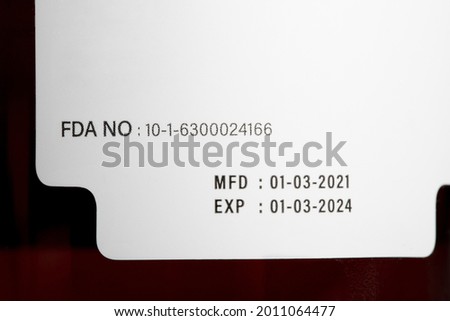 Instruction of FDA number, manufacturing date, and expiry date label of a product. Royalty-Free Stock Photo #2011064477