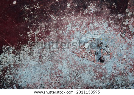 Aged rusty weathered background with cracks, scratches and spots or grunge rough surface backdrop.