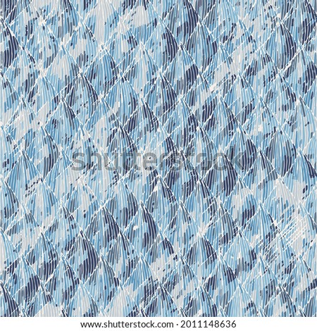 Abstract grunge texture.Dark and light blue background. Grunge retro texture pattern. Crossed zigzag lines.