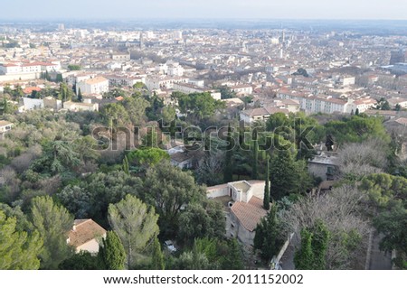 View of the French city of Nimes in winter. Winter cityscape in the South of France. Royalty-Free Stock Photo #2011152002