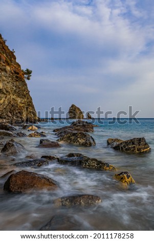 Picturesque Mediterranean seascape in Turkey. Picture taken in small bay near the Tekirova village, District of Kemer, Antalya Province. Long exposure photo.