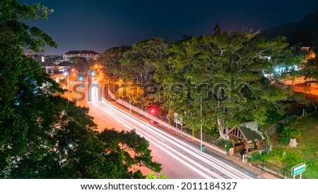 A long exposure of a busy city street at night