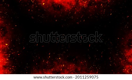 Fire embers particles over black background. Fire sparks background. Abstract dark glitter fire particles lights. bonfire in motion blur.