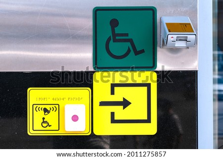 The call button for the disabled near the entrance