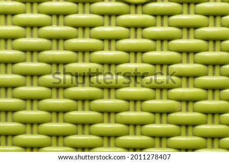 Chinese seamless pattern on green color plastic screen. Close up. Abstracts and backgrounds. Repeat vector knitted Design and pattern element. Net grid chain pattern cage industrial object.