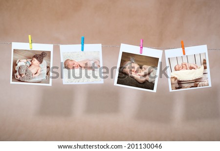 newborn photos attached clothespins on rope