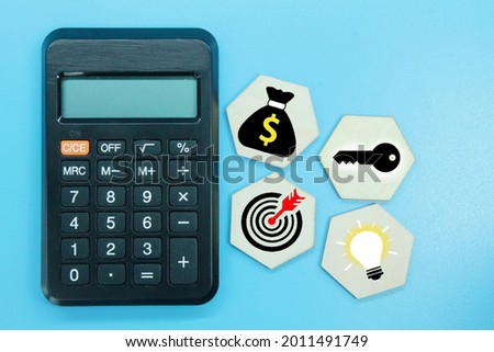 hexagon, calculator with targeted business icons and success concepts