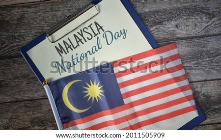 Malaysia National wording with Malaysia flag.