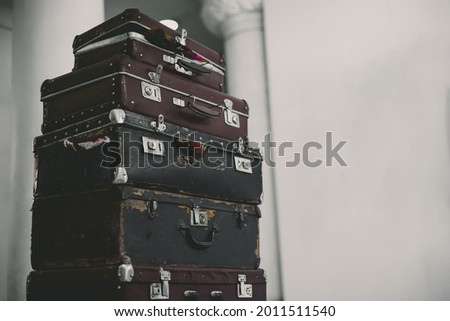 Stack Of Vintage Suitcases . background with large stack of antique suitcases