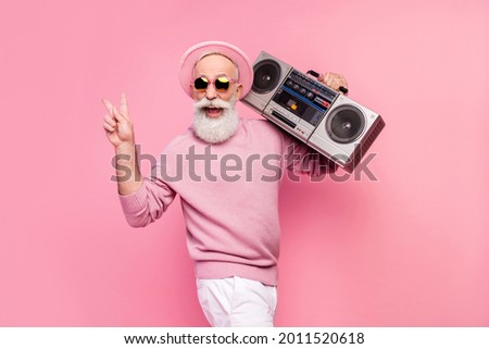 Profile photo of nice funny aged man with boom box wear eyewear cap show v-sign isolated on pink background