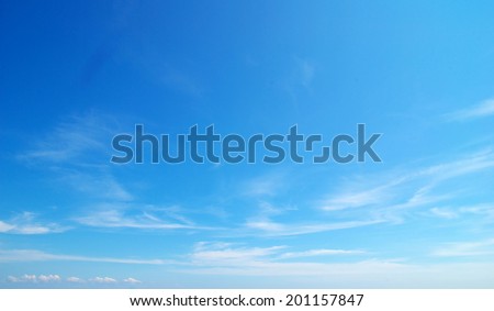 Blue sky background with tiny clouds Royalty-Free Stock Photo #201157847