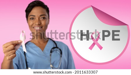 Composition of pink ribbon logo and breast cancer text, with smiling female doctor. breast cancer positive awareness campaign concept digitally generated image.