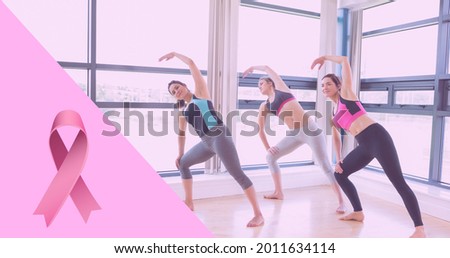 Composition of pink ribbon logo and breast cancer text, with diverse group of women practicing yoga. breast cancer positive awareness campaign concept digitally generated image.