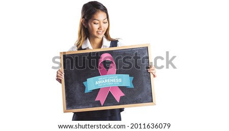 Composition of young smiling woman with pink ribbon logo and breast cancer text on white background. breast cancer positive awareness campaign concept digitally generated image.