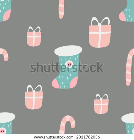 Seamless pattern for Christmas design in Scandinavian style. Christmas stocking, candy cane, presents. Kids illustration for packaging. Pattern is cut, no clipping mask.