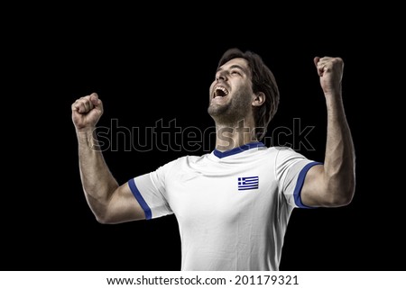 Greek soccer player, celebrating on a black background.
