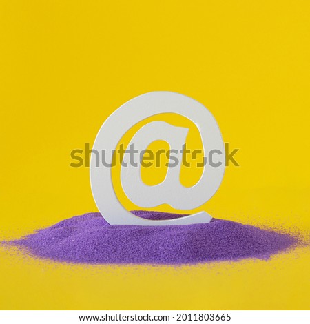 internet white word at on purple sand on the yellow illuminating summer yellow background. jungle tropical on line background. virtual background