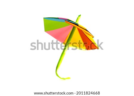 Paper multicolored umbrella on a white background
