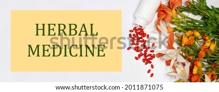 Banner with bioadditive tablets and medicinal plants with the inscription in Russian Herbal medicine