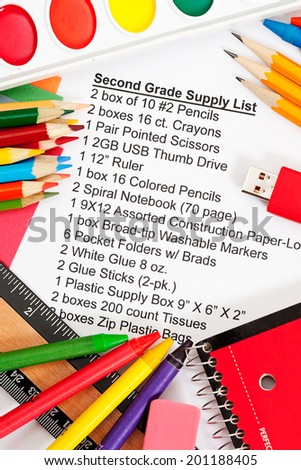 School: Required Item List For Second Grade Surrounded By Supplies Royalty-Free Stock Photo #201188405