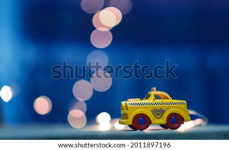 Taxi Toys photography with blue background 