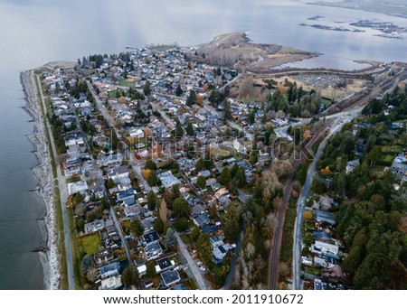 Aerial photograph of the community of Crescent Beach, British Columbia Canada on a moody fall day.	