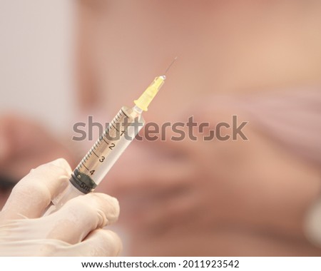 Vaccination concept  background with copy space
. Lipotropic injections close up. Woman Belly fat dissolving treatment. Body lifting injections syringe close up.