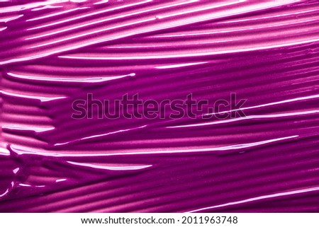 Lipstick balm vinous pink purple smudge texture background