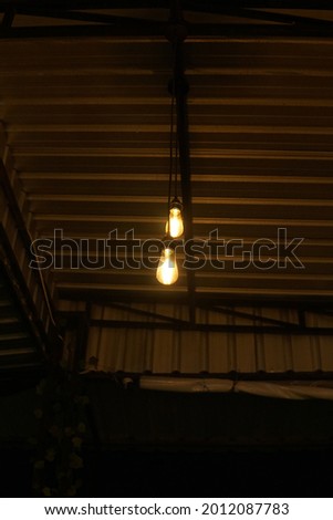 night Cafe with yellow retro lamp in pandemic corona