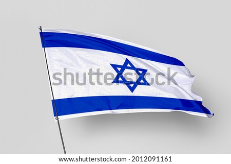 Israel flag isolated on white background. National symbol of Israel. Close up waving flag with clipping path.