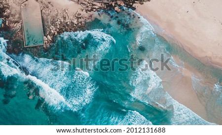 drone picture beach Australia surf waves natural pool blue water