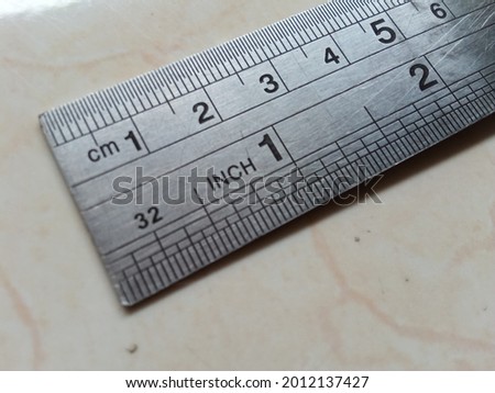 ruler, tool for measuring length
centimeters and inches Royalty-Free Stock Photo #2012137427