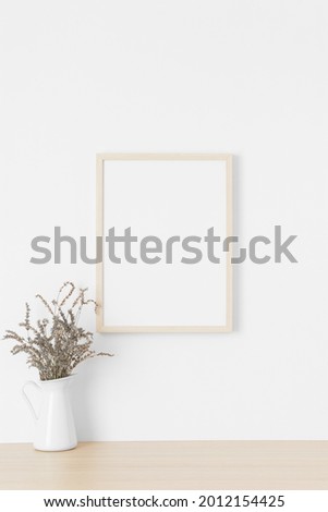 Wooden frame mockup on the wall with a lavender.