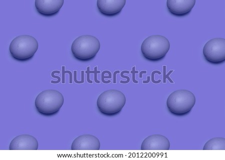 Purple color pattern eggs on lilac background