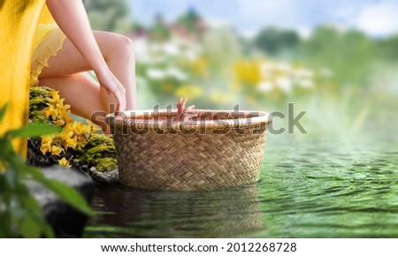 Baby Moses in a basket floating in a river found by Egyptian princess. Biblical theme concept. Royalty-Free Stock Photo #2012268728