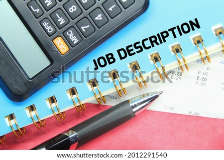 pen, notebook, calculator with the word JOB DESCRIPTION