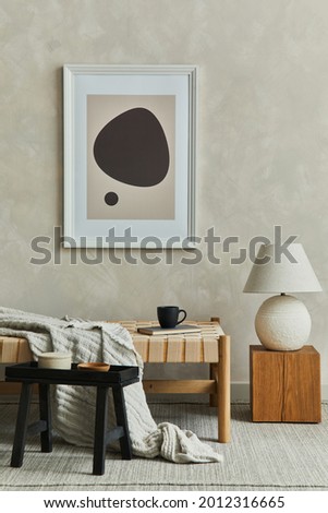 Stylish composition of cozy living room interior with mock up poster frame, plaid on the chaise longue, white lamp on the wooden cube, small black coffee table, and elegant personal accessories. 
