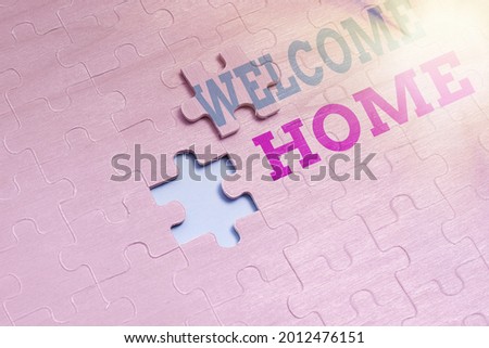 Handwriting text Welcome Home. Internet Concept Expression Greetings New Owners Domicile Doormat Entry Building An Unfinished White Jigsaw Pattern Puzzle With Missing Last Piece