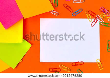 Multiple Assorted Collection Office Stationery Photo With Pens Pencils Notepads Notebook Ruler Stapler Scissors Clippers Paper Clips Holders Clipboard Placed Over Table