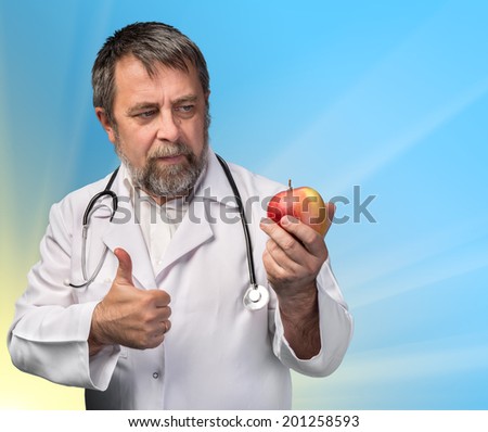 Good diet and healthy lifestyle concept. Doctor advises apple for healthy eating 