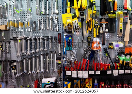 Various repair tools for sale on hardware store showcase . Royalty-Free Stock Photo #2012624057