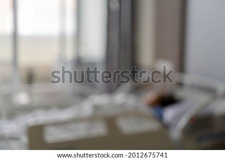 The blur of the sick patient get treatment on the bed inside the hospital elegant beautiful. picture for background. Hospital concept.