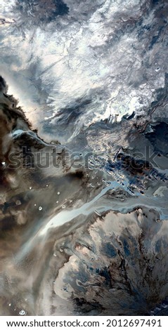 the contaminated antarctica, vertical abstract photography of the deserts of Africa from the air, imitating the polluted landscapes of Antarctica,