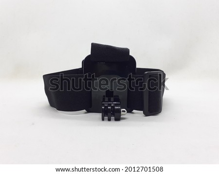Modern Black Action Sport Camera for Chest Head and Hand Strap Equipment Accessories in White Isolated Background 