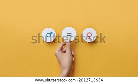 Paper circles with the icons men and women Equality between men and women. Gender equality and tolerance Royalty-Free Stock Photo #2012713634