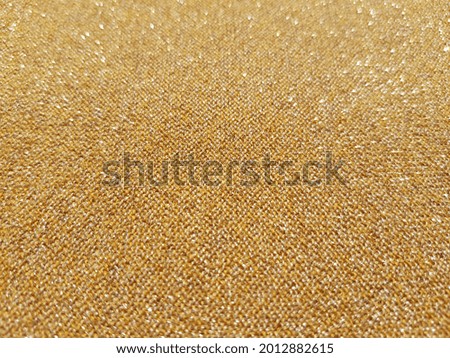 Yellow sparkling cloth
with lurex (smooth surface, texture).