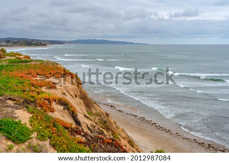 A wonderful landscape on the Pacific Ocean. Waves in cloudy weather on the California coast