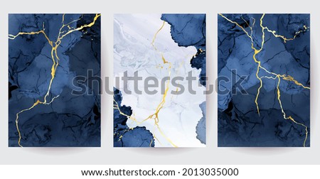 Classic blue watercolor fluid painting vector design cards. Dusty navy and golden geode frame. Winter wedding invitation. Snow,ice or veil texture. Dye splash style. Alcohol ink. Isolated and editable